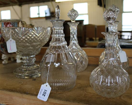 Regency cut glass decanter, a pair of decanters, another and a cut glass pedestal bowl (a.f.)